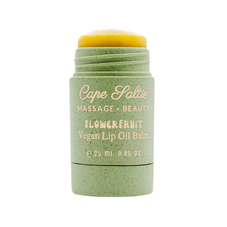 Cape Saltie's Flowerfruit Vegan Lip Oil Balm is the ultimate, best lip balm, lip gloss hybrid designed for bouncy hydration, glossy lips, and long-lasting moisture. This jumbo, supersized lip balm glides on like butter, offering a natural, sheer almost-pink tint that leaves your lips soft, supple, and tack-free. Infused with organic flavoring oils and a powerful blend of nourishing ingredients like grapeseed oil, organic coconut oil, sunflower seed oil, calendula flower, and mango seed butter, this vegan, g